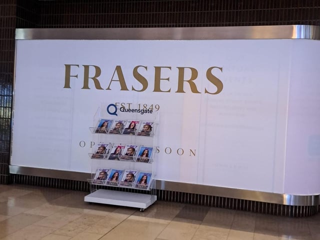 New signage at Peterborough's Queensgate Shopping Centre shows that retail giant Frasers is on its way to the city.
