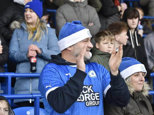 Peterborough United fans enjoy the impressive win over Oxford United.