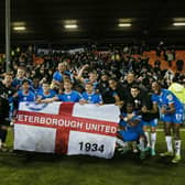 The Posh players celebrate in front of their fans after booking a place at Wembley. Photo: Joe Dent/theposh.com