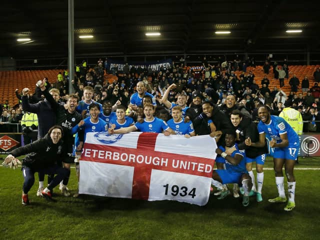 The Posh players celebrate in front of their fans after booking a place at Wembley. Photo: Joe Dent/theposh.com