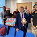 Mayor Paul Bristow with students and youth leaders after the CPCA board meeting on December 18 which saw the Tiger Pass scheme extended until March 2027 Photo: CPCA