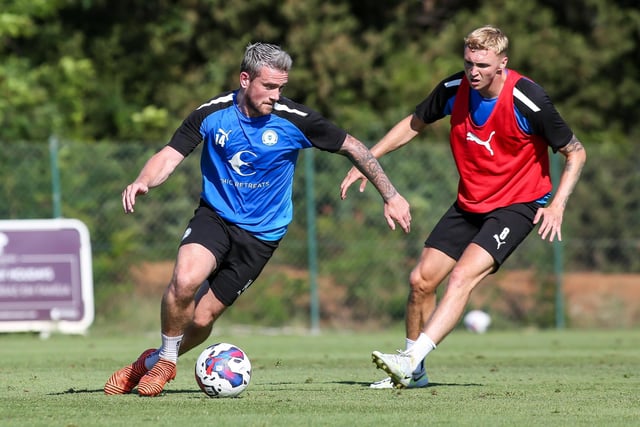 Jack Marriott is closed down by Jack Taylor during a training match.