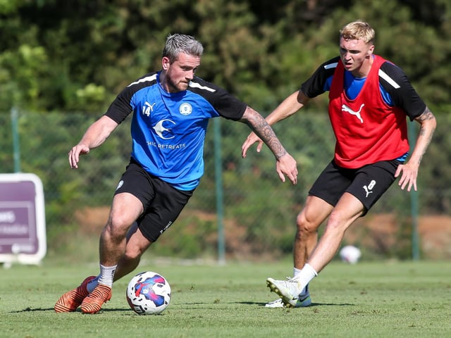 Jack Marriott is closed down by Jack Taylor during a training match.
