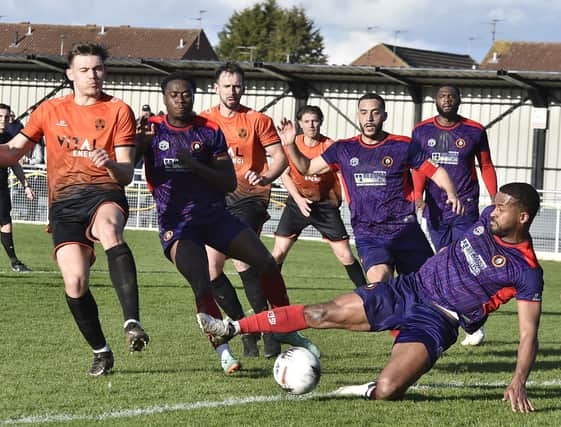 Action from Peterborough Sports (orange) v Rushall Olympic at PIMS Park. Photo David Lowndes.