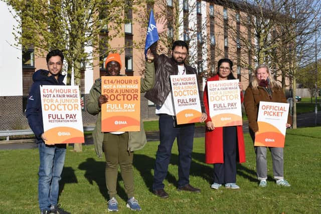 Junior doctors on picket duty outside the City Hospital on the first day of their strike.
