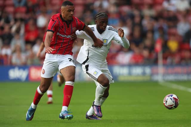 David Okagbue (left) in action for Walsall. (Photo by Nathan Stirk/Getty Images)