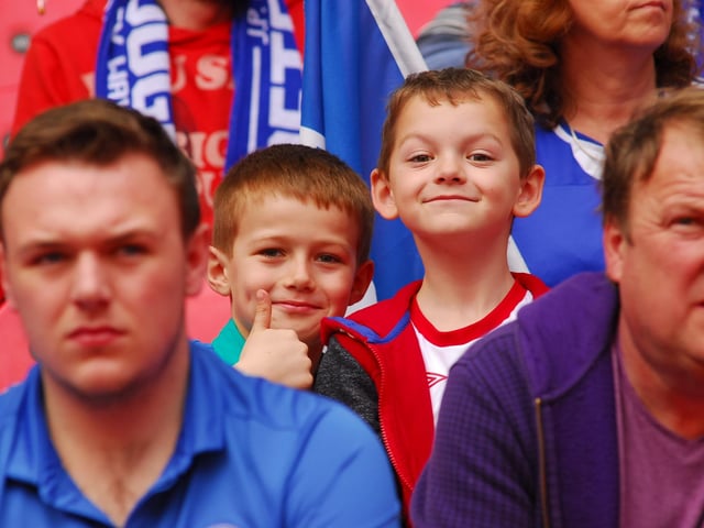 Peterborough United fans soak in the Wembley atmosphere in 2014.