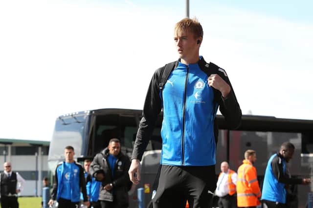 Lucas Bergstrom of Peterborough United arriving at the University of Bolton Stadium. Photo: Joe Dent/theposh.com