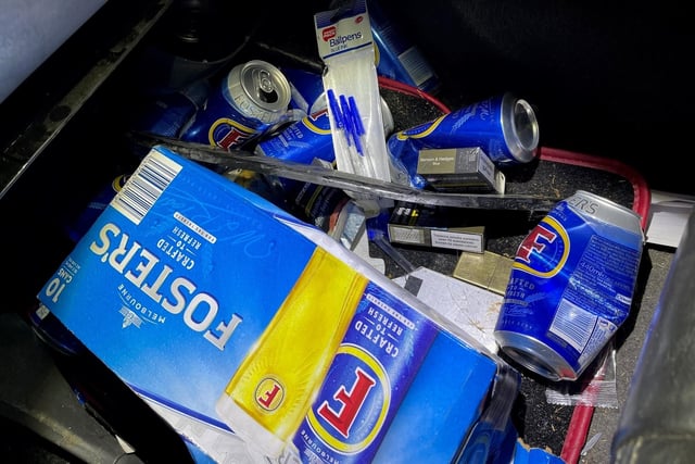 Cans of alcohol found in the crashed vehicle.