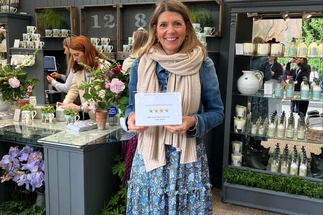 Homewares designer Sophie Allport at her stand at the Chelsea Flower Show with her four star award.