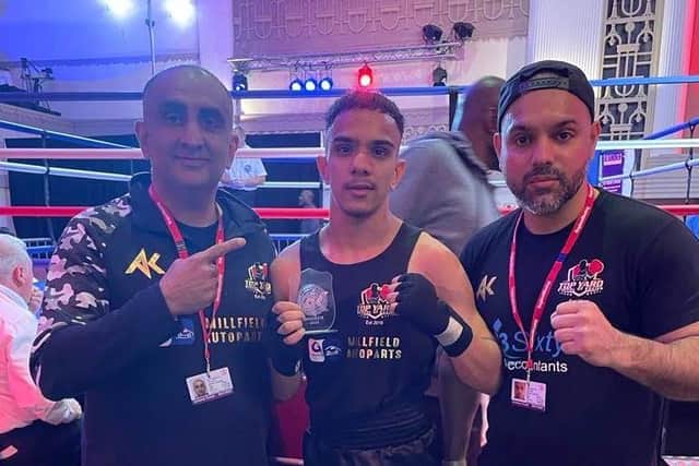 Subhaan Mohammed with his coaches.