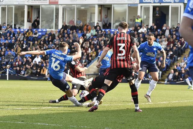 This Harrison Burrows effort for Posh was blocked by the Ipswich defence. Photo: David Lowndes.