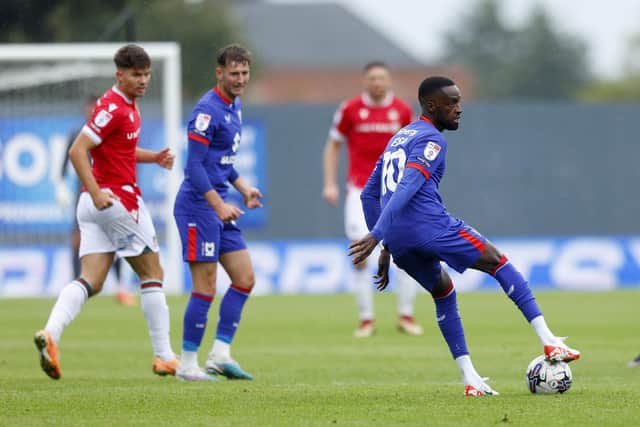 Mo Eisa on the ball for MK Dons at Wrexham. Photo by Malcolm Couzens/Getty Images.