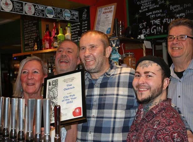 From left, Sue Minto, landlady, Alan Edwards, manager, Graham Finding, landlord, David Reeve-Shillito, manager and Dickie Bird, Branch Secretary Peterborough CAMRA at the presentation of the CAMRA Best City Pub award.