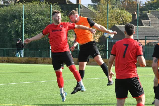 Stamford Bels (orange) in action earlier this season at Netherton United. Photo David Lowndes.