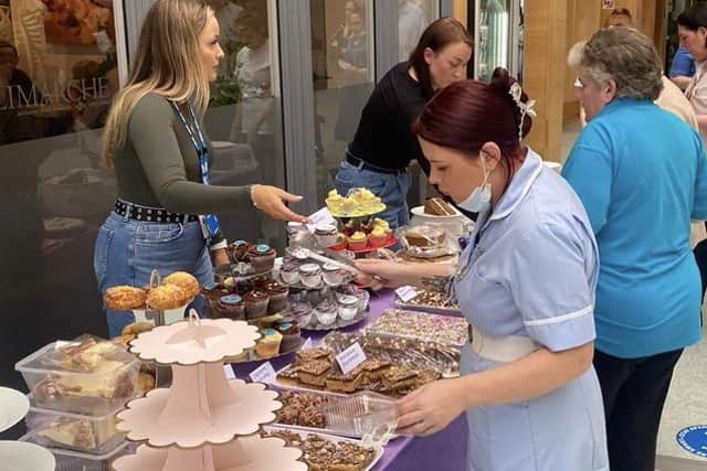 The cake sale raised hundreds of pounds