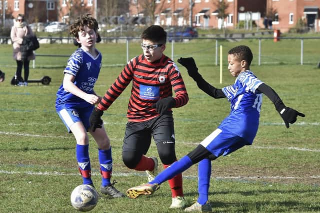 Football action from Park Farm Pumas v Hampton Blues  FC U12's, Photo: David Lowndes.