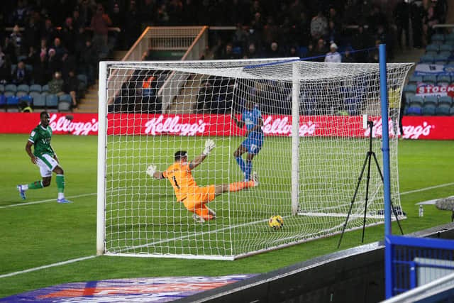 Kyrell Lisbie scores to make it 2-0 for Posh against Stockport County. Photo Joe Dent/theposh.com