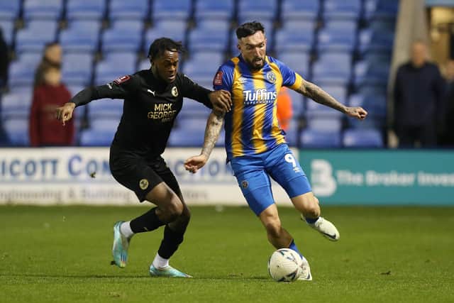 Ricky-Jade Jones (left) in action at Shrewsbury in the FA Cup earlier this season. Photo: Joe Dent/theposh.com.
