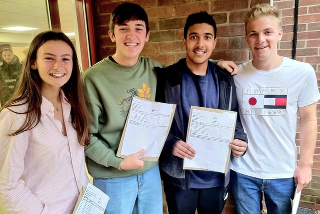 Happy King's School students with their GCSE results.