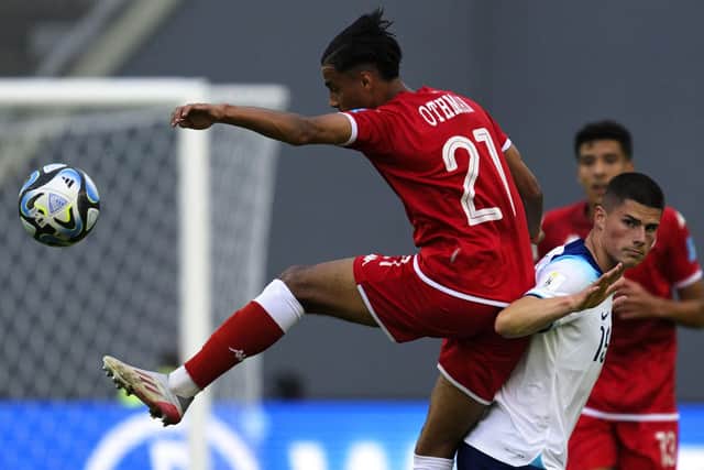 Ronnie Edwards (white shirt) in action for England against Tunisia. Photo by JUAN MABROMATA/AFP via Getty Images.
