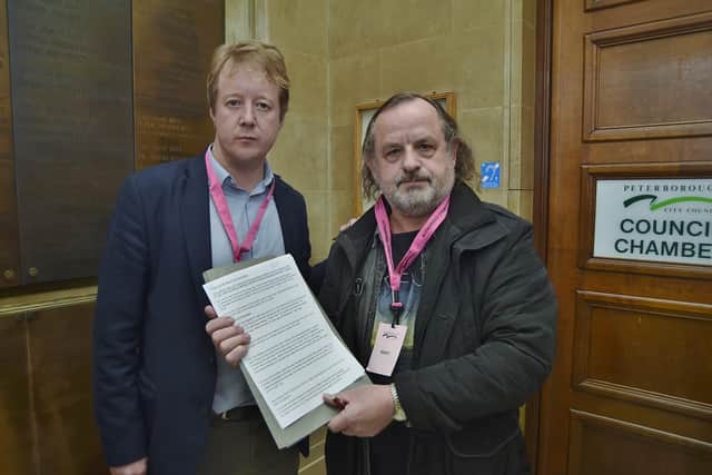 Paul Bristow MP with Dale McKean handing in a petition to full council to save the Eye library site