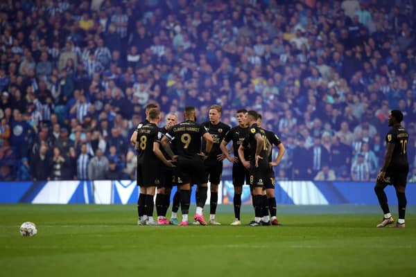 Posh players after conceding at Hillsborough in the play-off semi-final against Sheffield Wednesday in front of 31,385 fans. Photo: Joe Dent/theposh.com.
