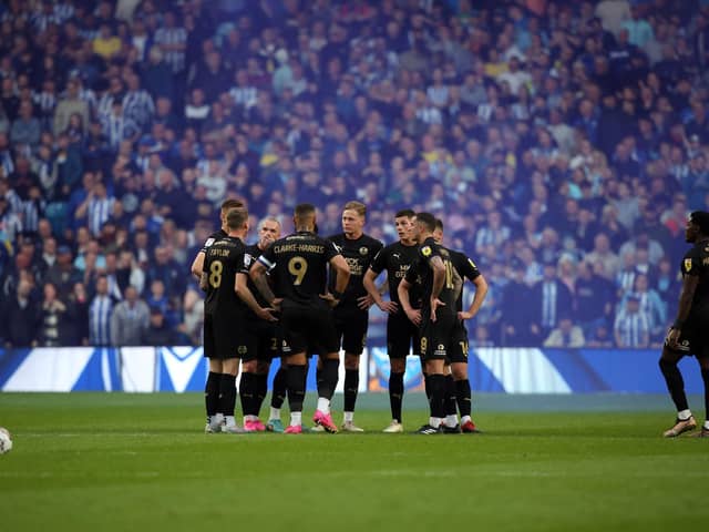 Posh players after conceding at Hillsborough in the play-off semi-final against Sheffield Wednesday in front of 31,385 fans. Photo: Joe Dent/theposh.com.