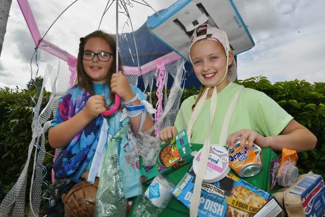 Hampton Vale pupils dressing up day to raise funds for ECO projects. Pictured are Tianne Potter and Eady-May Clark