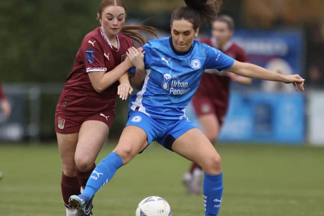 Tara Kirk in action for Posh Women v Cobblers. Photo Darren Wiles