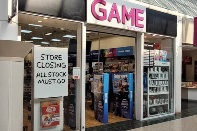 A closure sign in the window of Game at the Serpentine Green Shopping Centre, Hampton, Peterborough - it is understood the store will close at the end of the month.