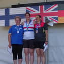 Andrea Jenkins (centre) after a previous World Championship win.