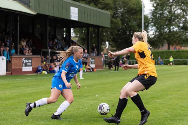 Katie Middleton (left) in action for Posh v Cambridge. Photo: Ruby Red Photography