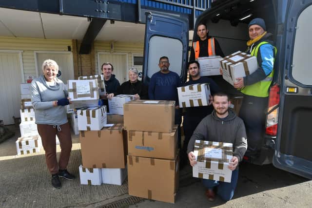 Nabil Ilahi with his Peterborough Prime charity volunteers loading 500 boxes of aid to send to Turkey and Syria from their storage facility at the East of England Arena