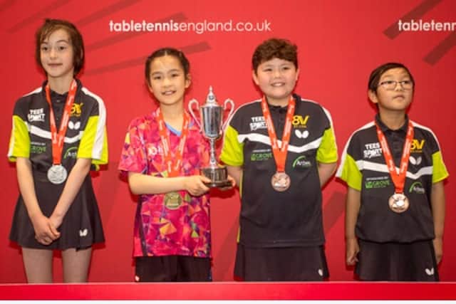 Under 11 medal winners, from left, Laura North, Alyssa Nguyen, Amber Lemmon and Cindy Xiao.
