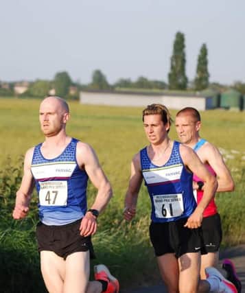 From the left, Luke Brown, Kai Chilvers and Dave Hudson in the Eye 5k race.