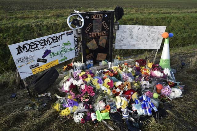 Roadside tributes to Cain Martin at New Cut, Thorney.