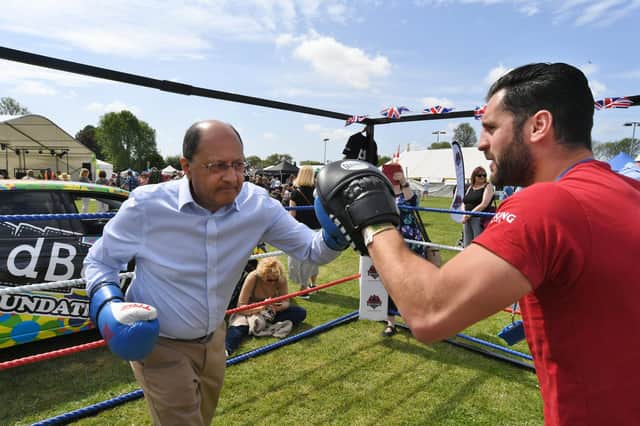 Shailesh Vara MP spars with former professional boxer Marcello Renda.