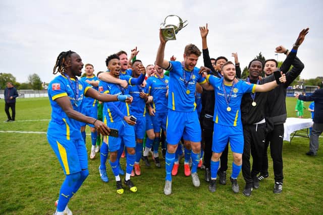 Peterborough Sports celebrate their play-off final victory.