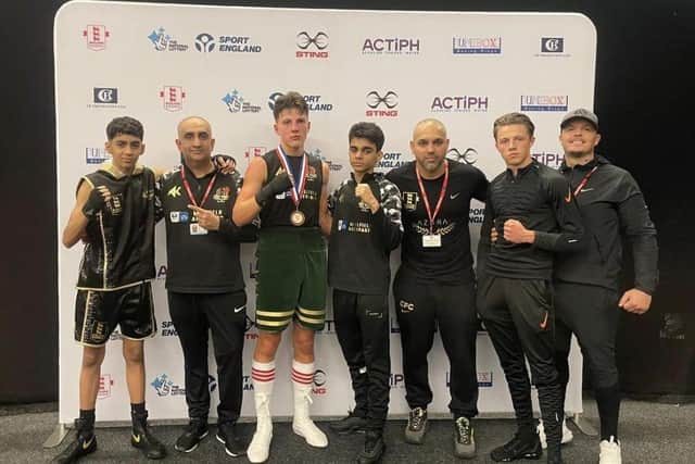 Top Yard fighters and coaches at the National Junior Championships. from left, Aamir Shirazi, Akif Shirazi, Claude Gray, Adam Javed, Bilal Javed, John Doe, Henry Doe.