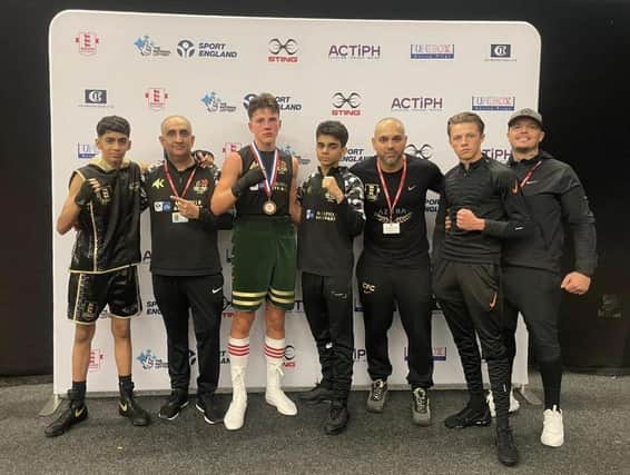 Top Yard fighters and coaches at the National Junior Championships. from left, Aamir Shirazi, Akif Shirazi, Claude Gray, Adam Javed, Bilal Javed, John Doe, Henry Doe.