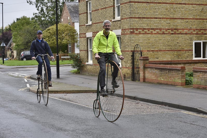 Penny-farthing cyclists David Loose (yellow) and Michael Gray "going out on a high."