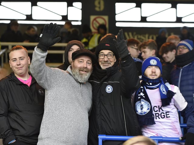 Peterborough United fans watch the 2-1 FA Cup win over Doncaster Rovers.