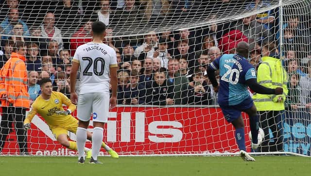 Adebayo Akinfenwa of Wycombe Wanderers scores the equalising goal from the penalty spot against Posh in 2019. Photo: Joe Dent/theposh.com.