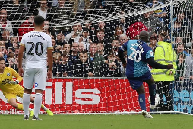 Adebayo Akinfenwa of Wycombe Wanderers scores the equalising goal from the penalty spot against Posh in 2019. Photo: Joe Dent/theposh.com.