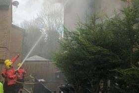 Crews tackling the blaze. Picture: Heath Purvis
