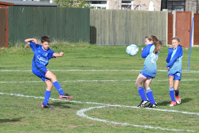 Action from ICA Juventus U12s (dark blue) v Swavesey Spartans at Ringwood. Photo: David Lowndes.