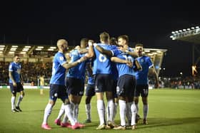 Posh players celebrate a goal against Sheffield Wednesday at London Road. Photo: David Lowndes.