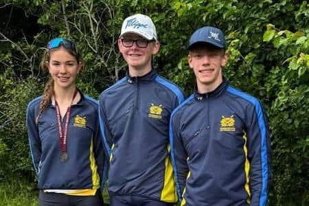 From the left, Beatrice Gregory, Jack Bosma and Thor Read Moreira Lima at the National Junior Sculling Regatta.