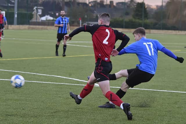 Action from Netherton United Reserves v Cardea (blue) in Division One of the Peterborough League. Photo: David Lowndes.